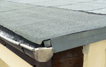 repair or replace Tanis flat roofing?